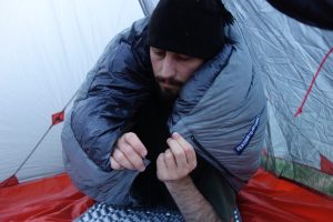 Feathered Friends Flicker UL 20 Quilt Sleeping Bag - sleeping with zipper underneath