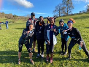 Black Trail Runners at a race