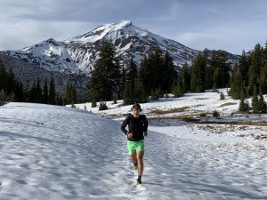 Zach Miller running in fresh snow