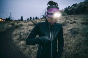 Best Winter Running Jackets - zipping the Nathan Navigator Hybrid Jacket