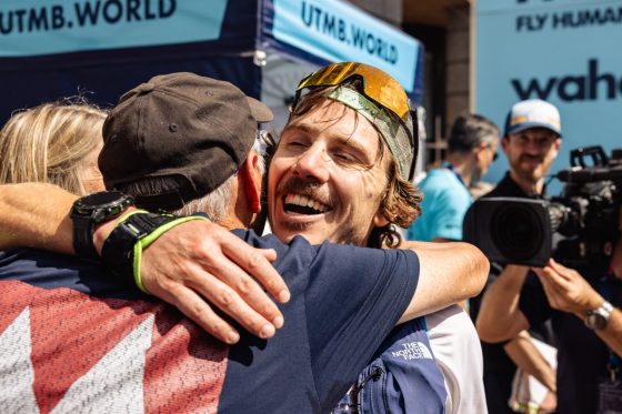 Zach Miller hugging Coach Bradley 2023 UTMB - feature photo