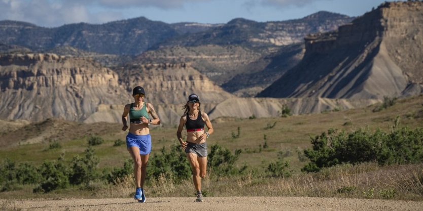Women running on dirt road