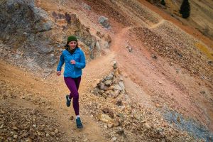 Best Running Tights for Women - running on rocky trail