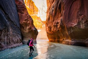 Best Insulated Jacket for Running - wearing The North Face ThermoBall Hoodie fastpacking in canyon