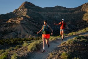 Best Running Tank Top for Women - wearing a running vest over a tank top