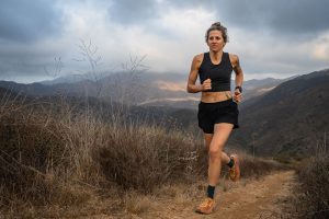 Best Sports Bras for Running - running on trail in Janji Long Bra