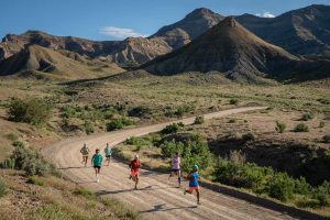 Best Stability Running Shoes - group running on dirt road