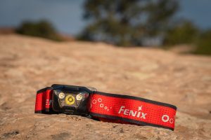Best Running Headlamp - close-up of Fenix HL18R-T V2.0 Rechargeable Headlamp in field
