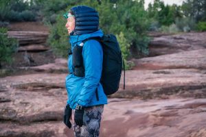 Best Running Headlamp - runner wearing fastpack and testing headlamp