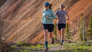 Best Running Shoe for Women - two women testing trail shoes