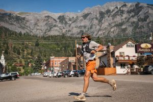 Zach Miller running in Ouray during 2025 Hardrock 100