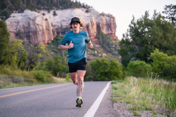 Best Road-to-Trail Shoes - runner on Colorado road mid-stride