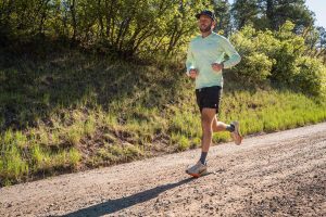 Best Road-to-Trail Shoes - runner in Nike Pegasus 41 on sunny crushed gravel road