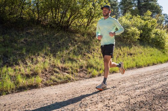 Best Road-to-Trail Shoes - runner in Nike Pegasus 41 on sunny crushed gravel road
