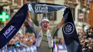 2025 UTMB - Tom Evans - finish banner