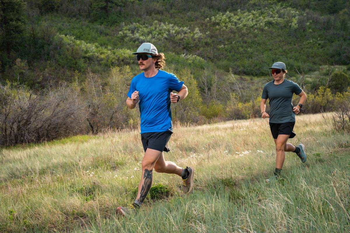 Two runners on singletrack