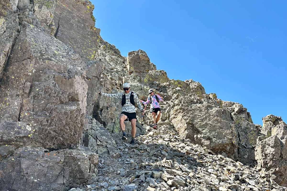 Eszter and Max on scree slope - San Juan Mountains - Colorado