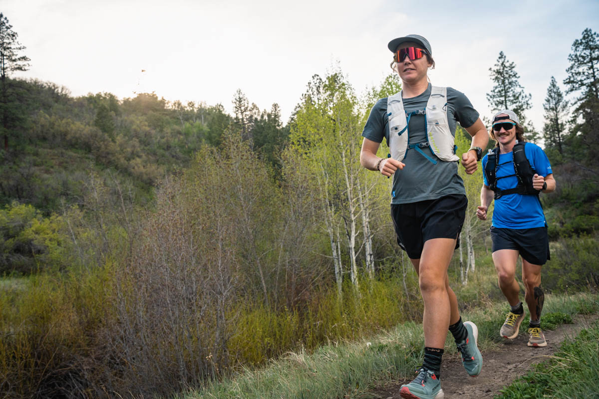 Best Running Vest - two people running down trail