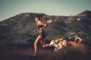 Brianna Corremonte running with dog