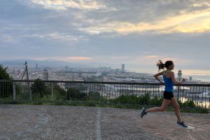 Sabrina Little running outside of city