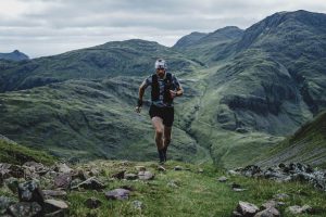 Damian Hall running on fells
