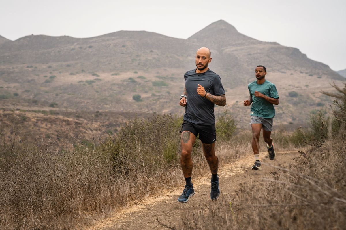 Best Road-to-Trail Shoes - two runners on desert gravel trail