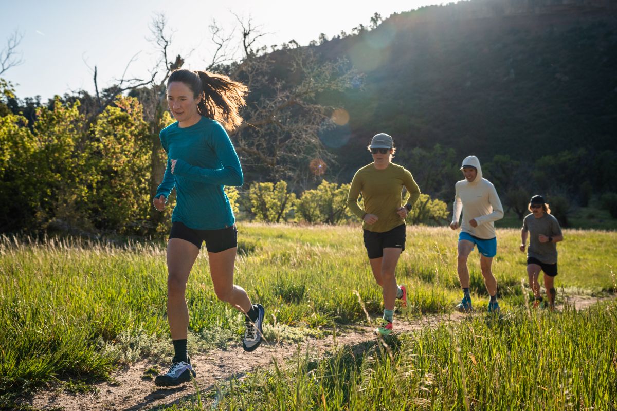 Best Road-to-Trail Shoes - four runners on light trail in Colorado