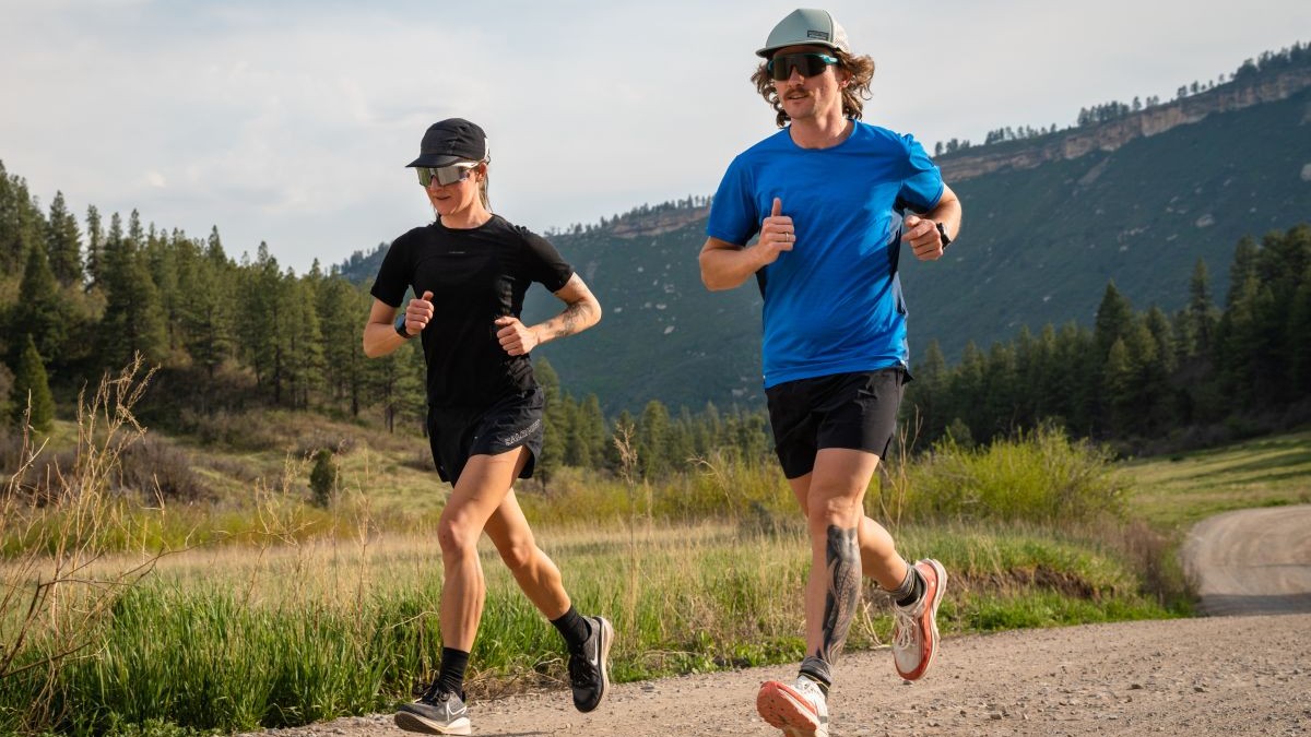 Best Road-to-Trail Shoes - two runners on gravel road in mountains