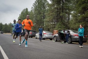 Wesley Kiptoo Alex Masai Adrian Wildschutt - running by Mailboxes