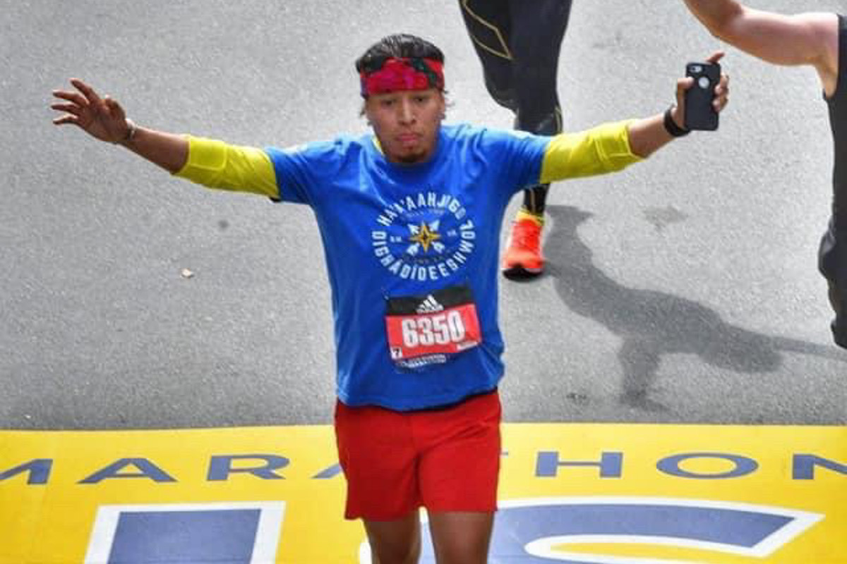 Harold Bennally finishing the Boston Marathon