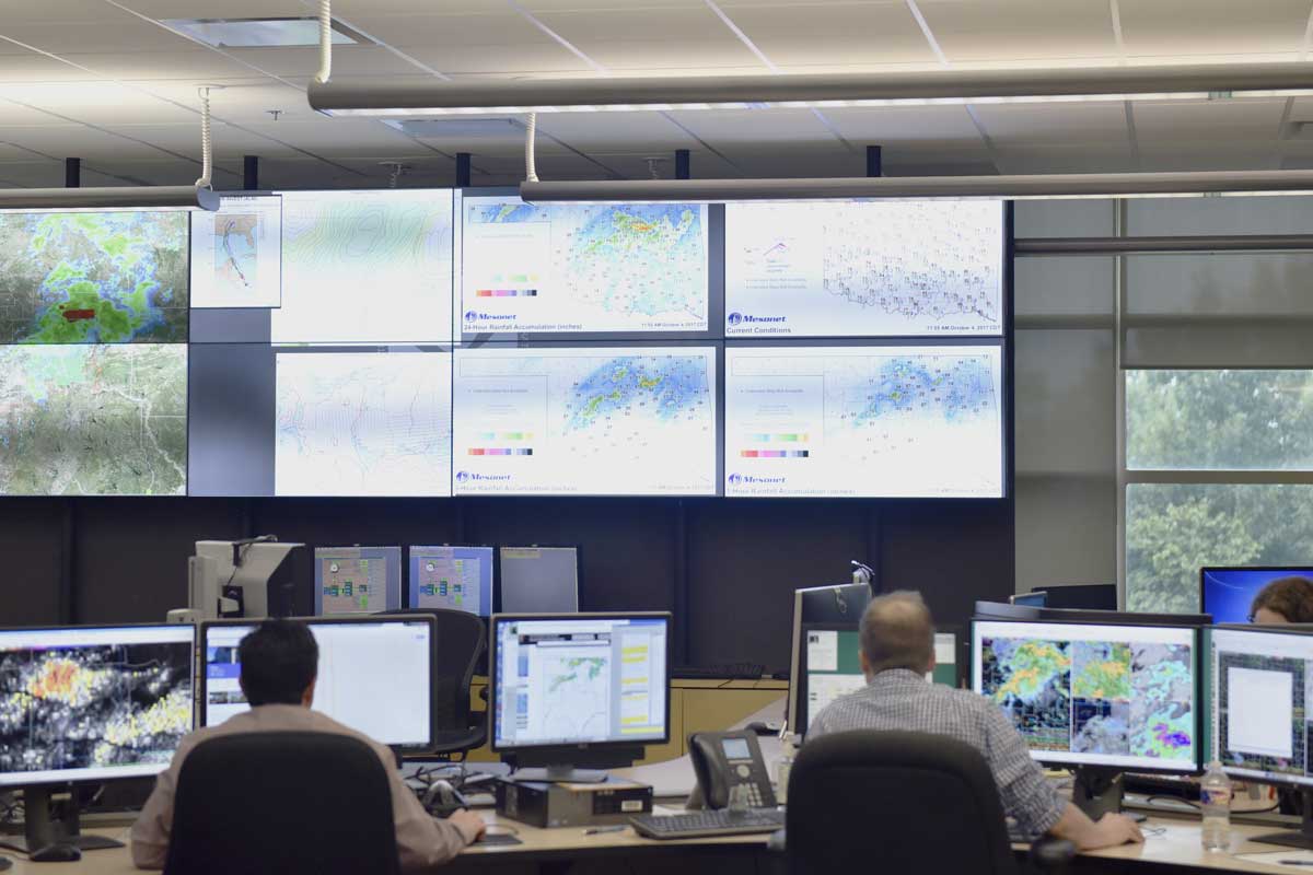 Screens display Mesonet data in the local forecasting office at the National Weather Center in Norman.