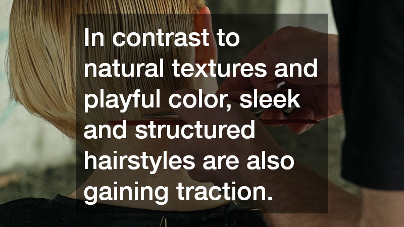 In contrast to natural textures and playful color, sleek and structured hairstyles are also gaining traction.