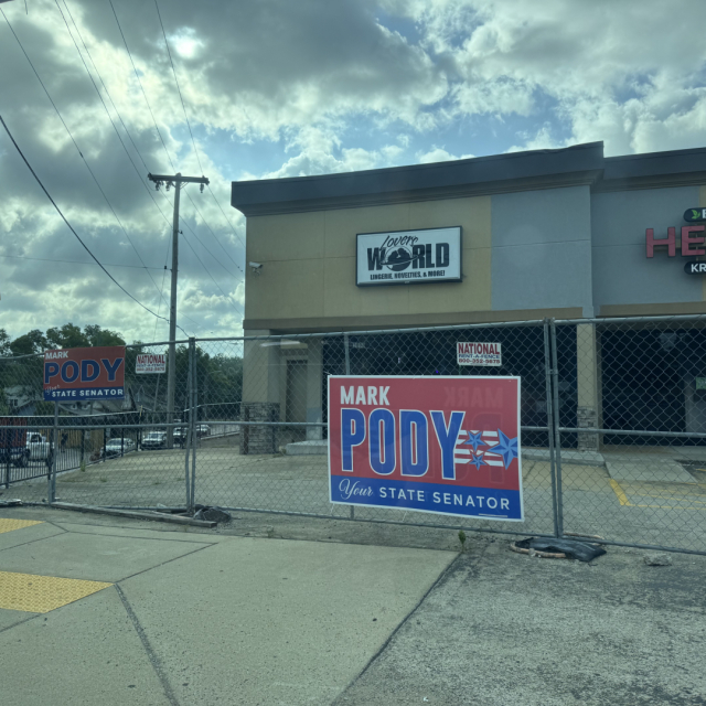 A Mark Pody for State Senate sign in front of an adult bookstore in East Nashville.