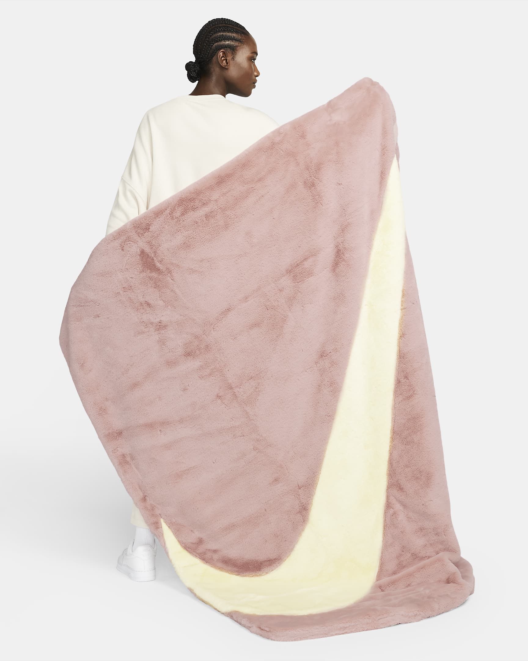 You can easily get your hands on this cozy Nike Fleece Blanket