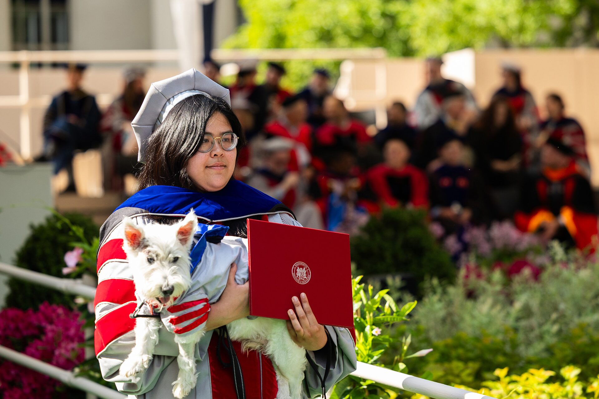 Scene at MIT: A nanoscientist graduates with her very good boy