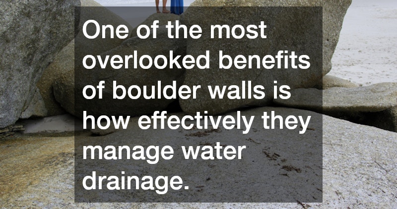 One of the most overlooked benefits of boulder walls is how effectively they manage water drainage. 