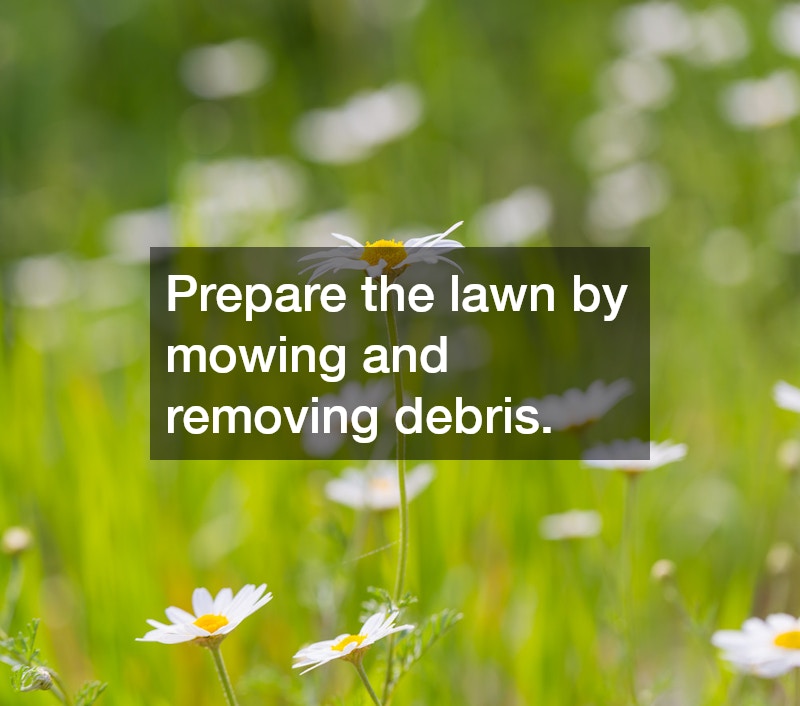 Prepare the lawn by mowing and removing debris.