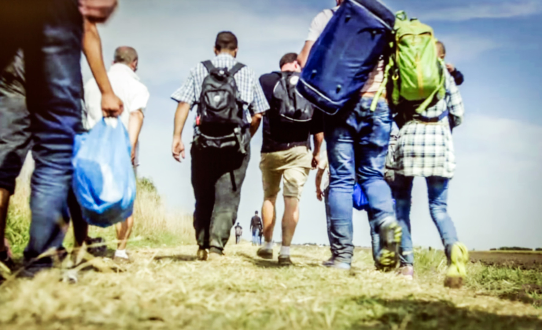 Migrants walking Migrants walking