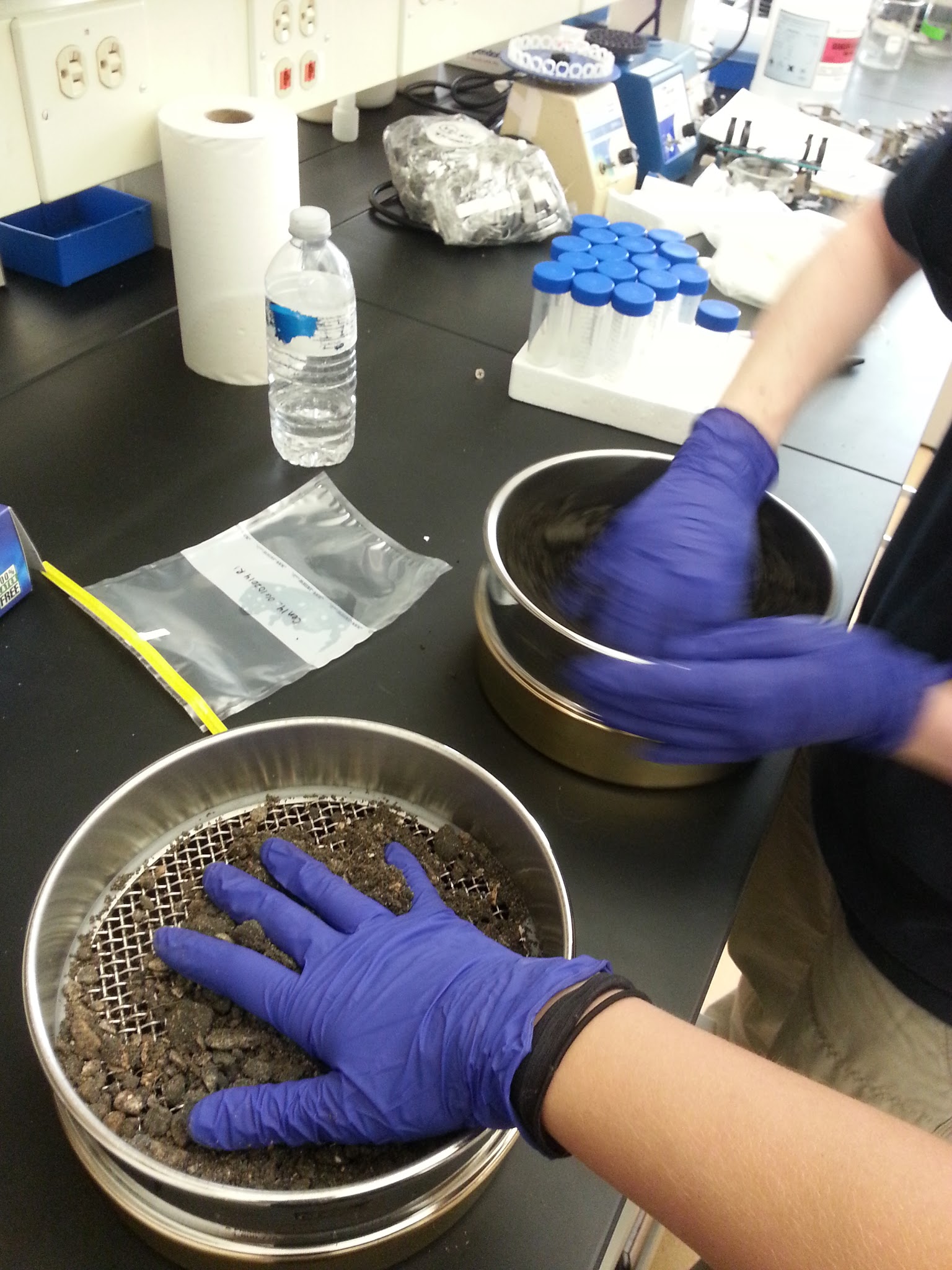 Sieving soil Sieving soil