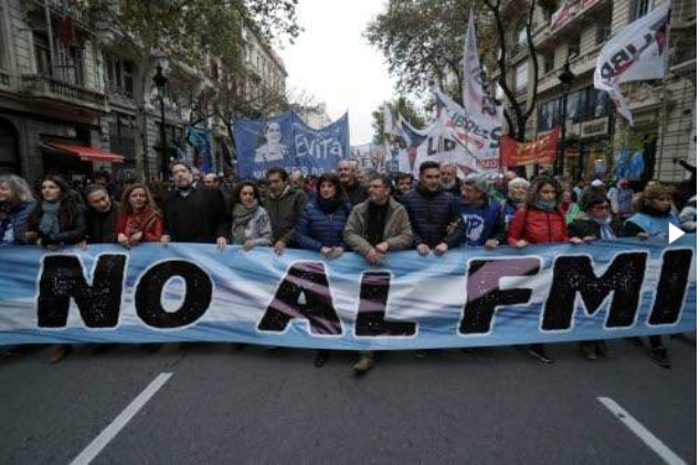 Union workers, along with members of social, political and students organisations, demonstrate against the government's negotiations with the International Monetary Fund in Buenos Aires Union workers, along with members of social, political and students organisations, demonstrate against the government's negotiations with the International Monetary Fund in Buenos Aires