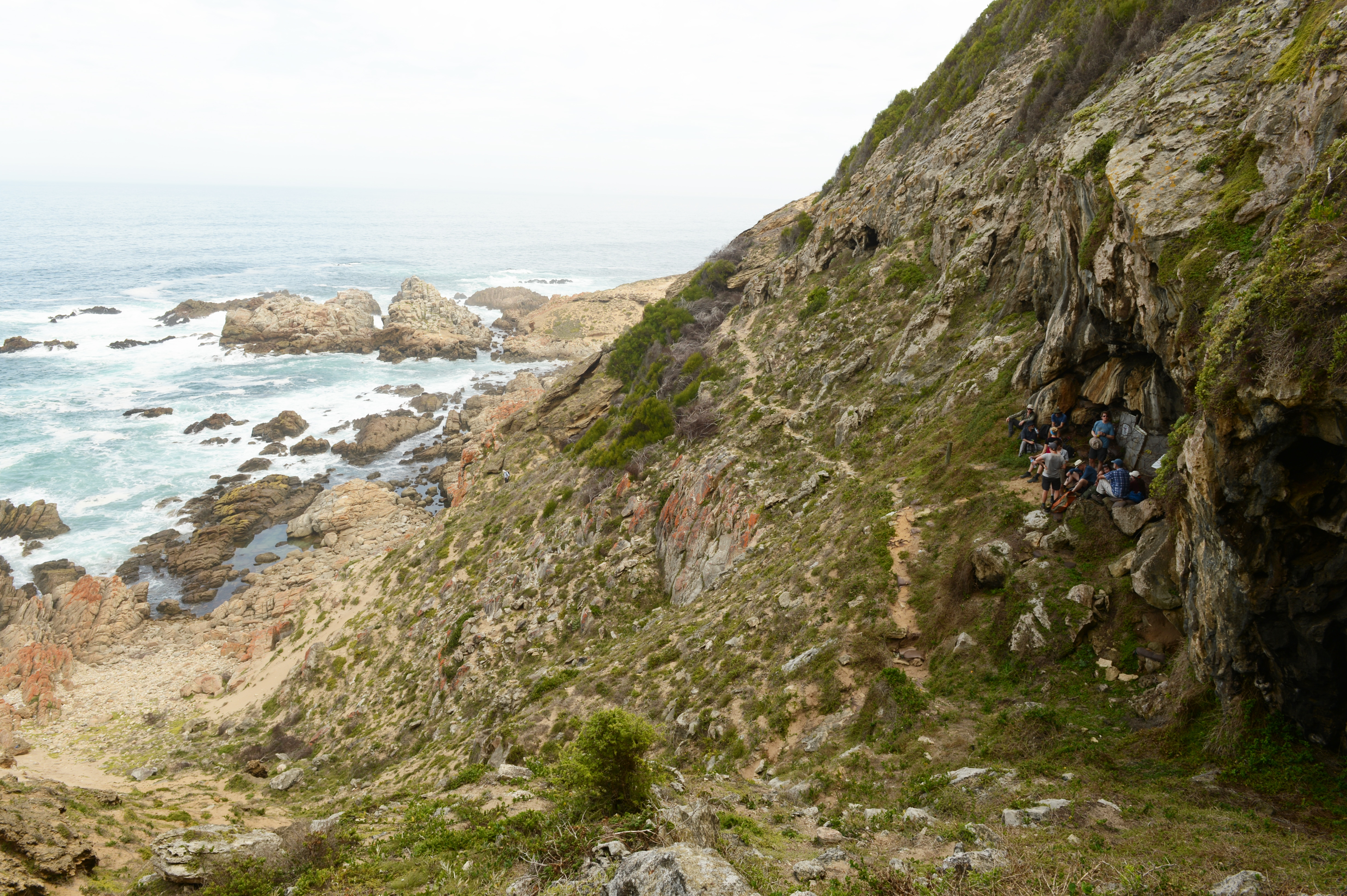 View of Blombos Cave during a visit by the SapienCE team in 2018 (Image courtesy of Ole Fredrik Unhammer) View of Blombos Cave during a visit by the SapienCE team in 2018 (Image courtesy of Ole Fredrik Unhammer)