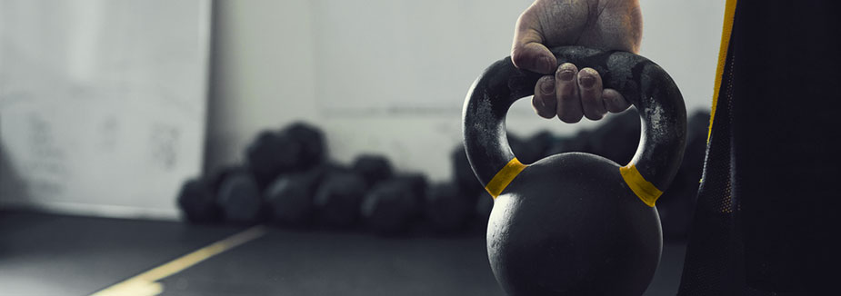 man-holding-kettlebell-weight