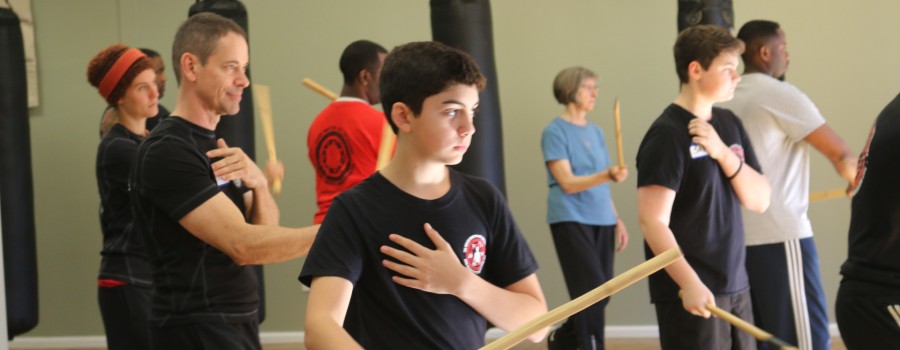 group of students practicing martial arts