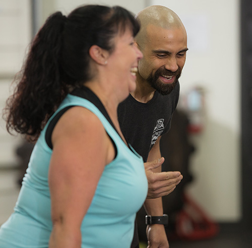 tnsf-homerev Langley Personal Trainer coaching client.