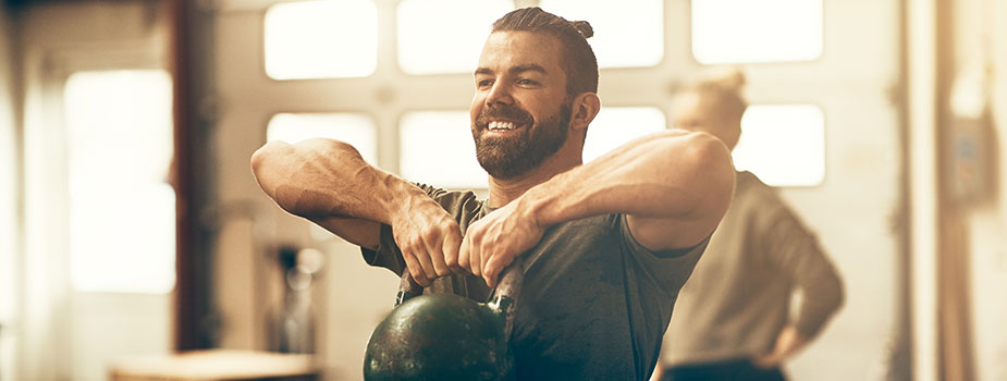 CrossFit-16 Man lifting kettlebell