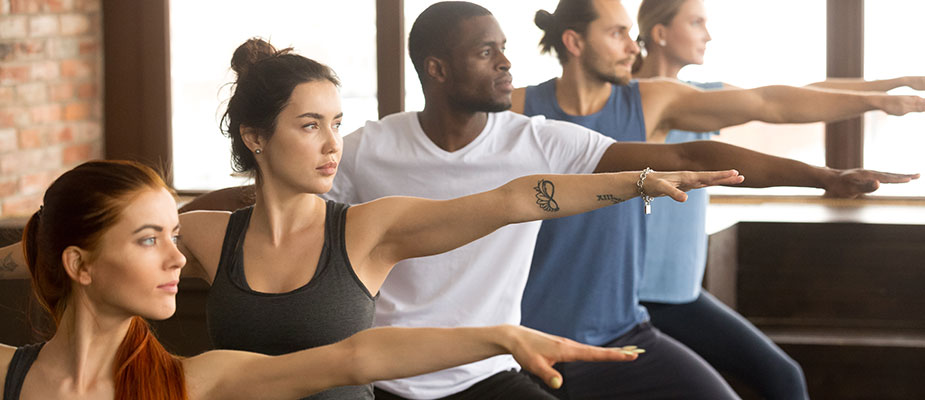 Warrior-pose-in-group-class