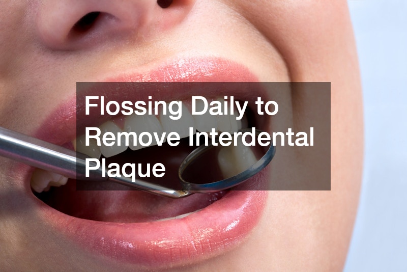 Flossing Daily to Remove Interdental Plaque