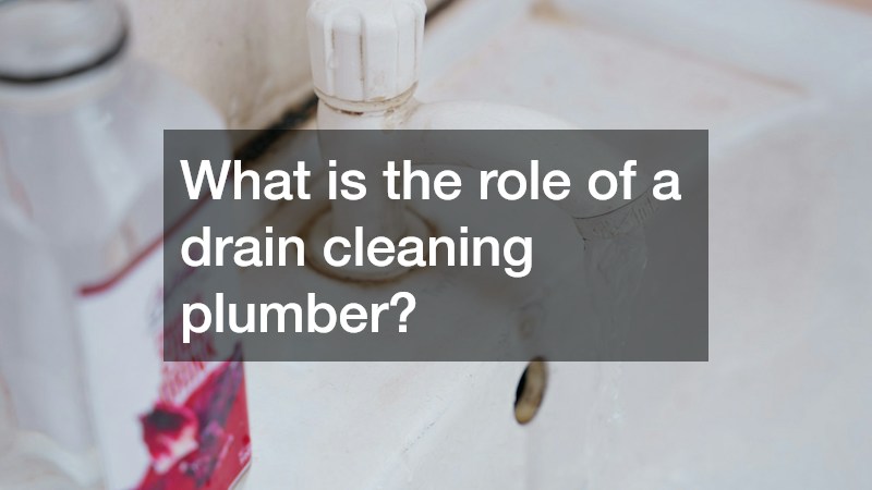 What is the role of a drain cleaning plumber?