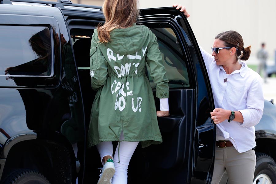 Melania Trump enters a car wearing a jacket that reads "I don't really care do you?"
