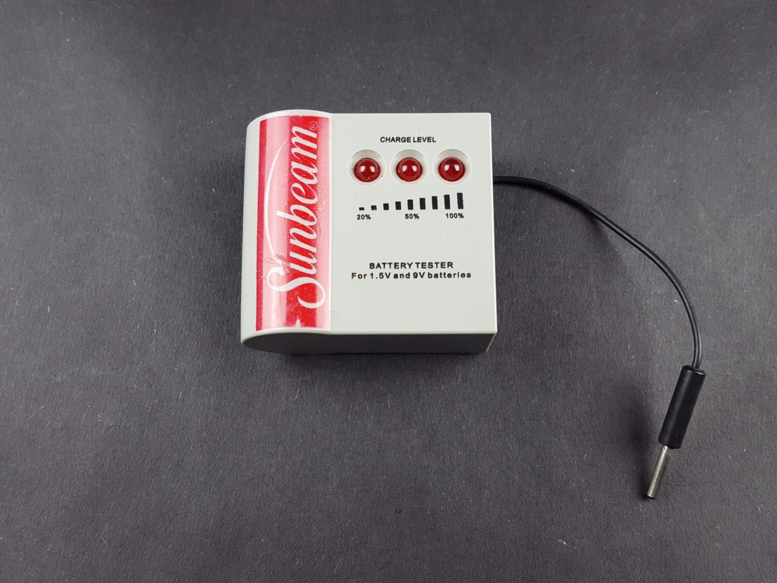 A battery tester with lights that indicate the percentage left in a battery.